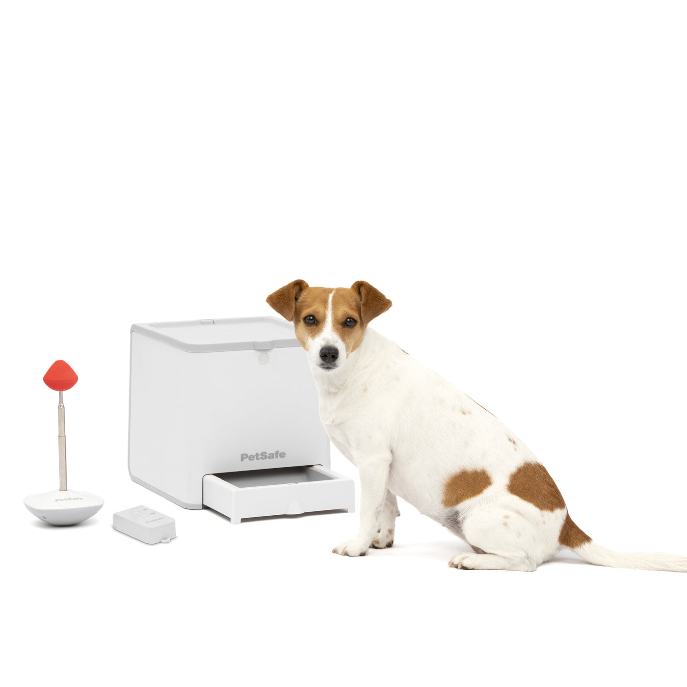 PetSafe Teach & Treat Remote Reward Trainer with remote and target, official product photo